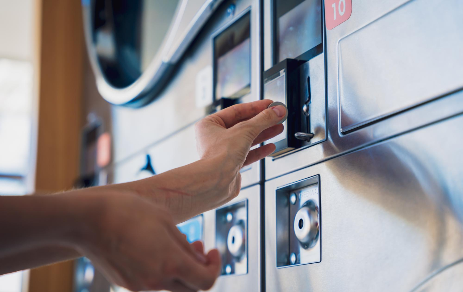 Paiement sur une machine de laverie automatique